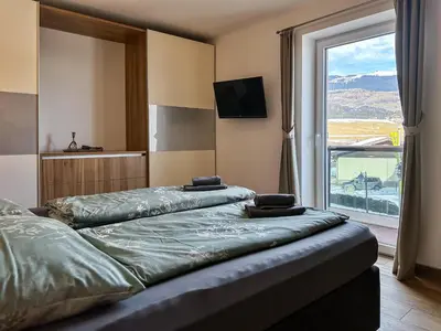 Ein Bett oder Betten in einem Zimmer der Unterkunft Our's Living - modern Apartments with Sauna near Kitzbüheler Alpen ski lift