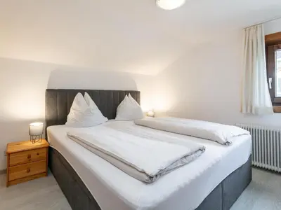 Ein Bett oder Betten in einem Zimmer der Unterkunft Rettenstein