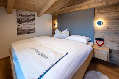 Ein Bett oder Betten in einem Zimmer der Unterkunft Ferienwohnung 73 - Top Bergkristall