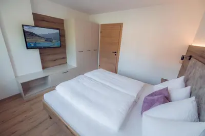 Ein Bett oder Betten in einem Zimmer der Unterkunft Apart Eder