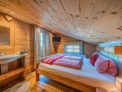 Ein Bett oder Betten in einem Zimmer der Unterkunft Hilde XL