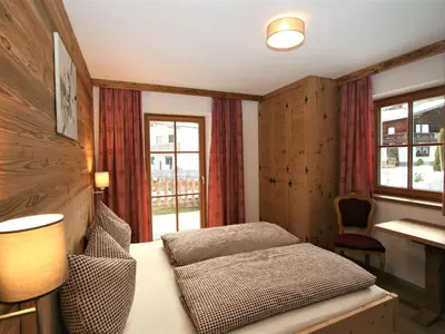 Ein Bett oder Betten in einem Zimmer der Unterkunft Apartment Zauberwinkel-1 by Interhome