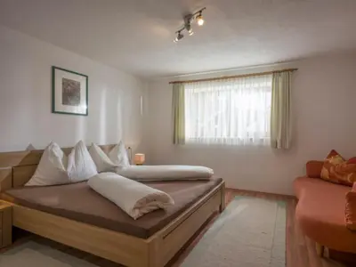 Ein Bett oder Betten in einem Zimmer der Unterkunft Gästehaus Schwaiger - Lendgasse