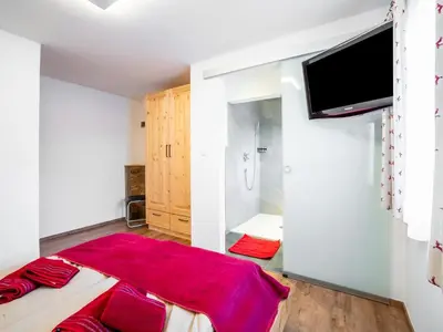 Ein Bett oder Betten in einem Zimmer der Unterkunft Chalet in Neukirchen near Ski Arena Wildkogel