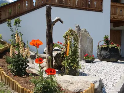 Ein Garten an der Unterkunft Apartment Gasteighof-2 by Interhome