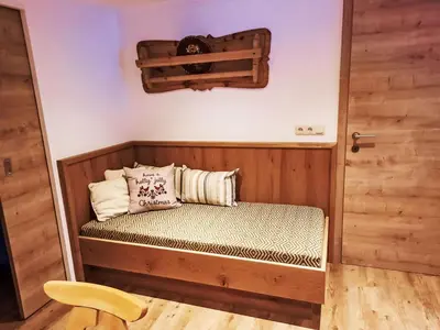 Ein Bett oder Betten in einem Zimmer der Unterkunft Apartment Althaus by Interhome