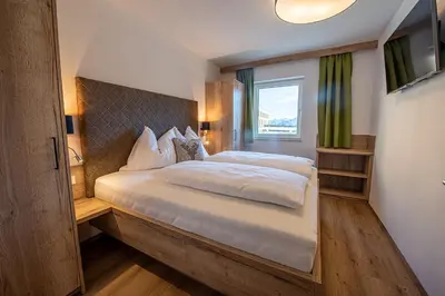 Ein Bett oder Betten in einem Zimmer der Unterkunft AppartMO 243 Top 4