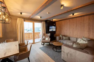 Ein Sitzbereich in der Unterkunft Filzsteinresort Wohnungen Top 3