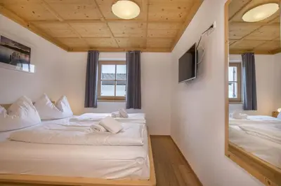 Ein Bett oder Betten in einem Zimmer der Unterkunft Schöneben Chalet Anne Marie