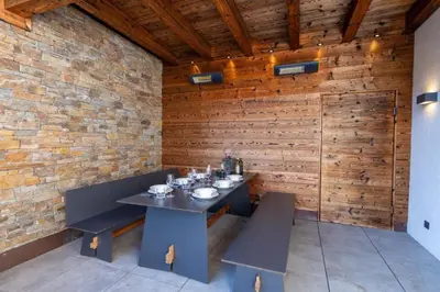Ein Sitzbereich in der Unterkunft Nationalpark Chalet Schlieferspitze