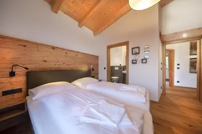 Ein Bett oder Betten in einem Zimmer der Unterkunft Nationalpark Chalet Kreuzspitze