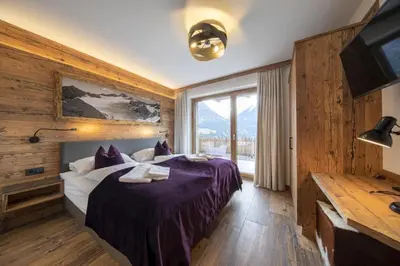 Ein Bett oder Betten in einem Zimmer der Unterkunft Nationalpark Chalet Bretterspitze