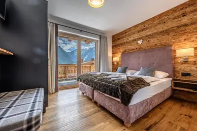 Ein Bett oder Betten in einem Zimmer der Unterkunft Nationalpark Chalet Schwarzes Hörndl