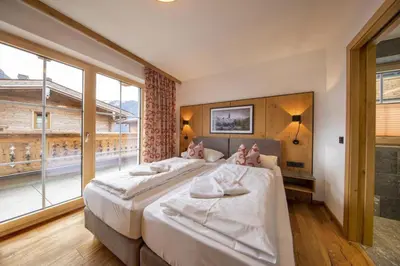 Ein Bett oder Betten in einem Zimmer der Unterkunft Nationalpark Chalet Rötspitze