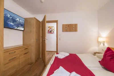 Ein Bett oder Betten in einem Zimmer der Unterkunft Residenz Wildkogelbahnen Top 8