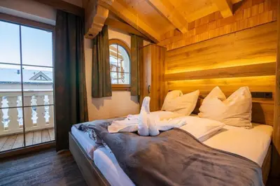 Ein Bett oder Betten in einem Zimmer der Unterkunft Falkensteinalm Big Family XL
