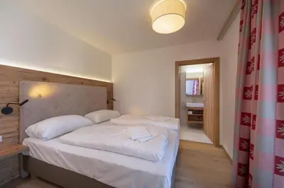 Ein Bett oder Betten in einem Zimmer der Unterkunft Edelweisshaus Top 12
