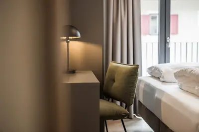 Ein Bett oder Betten in einem Zimmer der Unterkunft Gipfelglueck Family