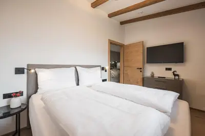 Ein Bett oder Betten in einem Zimmer der Unterkunft Gipfelglueck Comfort