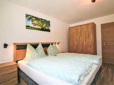 Ein Bett oder Betten in einem Zimmer der Unterkunft Apartment Rumer Blick by Interhome