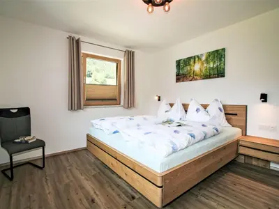 Ein Bett oder Betten in einem Zimmer der Unterkunft Apartment Vom Gerslosstein zum Rumerblick by Interhome