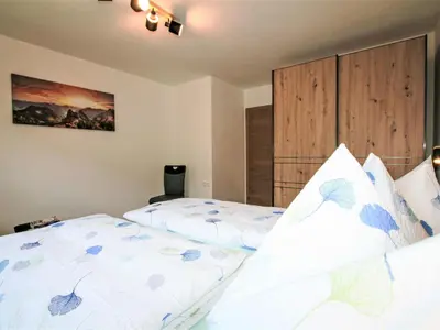 Ein Bett oder Betten in einem Zimmer der Unterkunft Apartment Gerlosstein Blick by Interhome