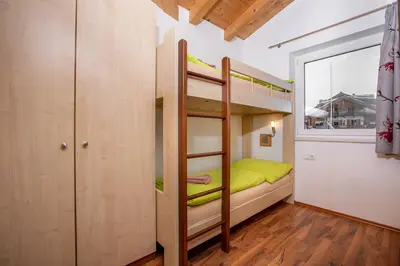 Ein Bett oder Betten in einem Zimmer der Unterkunft Chalet Central Top CC 7
