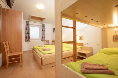 Ein Bett oder Betten in einem Zimmer der Unterkunft Chalet Central Top CC 6