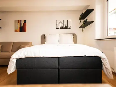 Ein Bett oder Betten in einem Zimmer der Unterkunft Prost