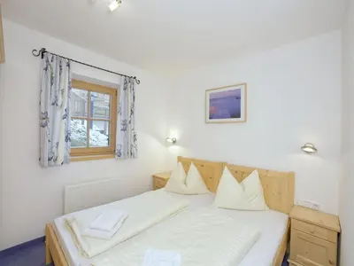 Ein Bett oder Betten in einem Zimmer der Unterkunft Chalet in Austria near Ski Bus and Sauna