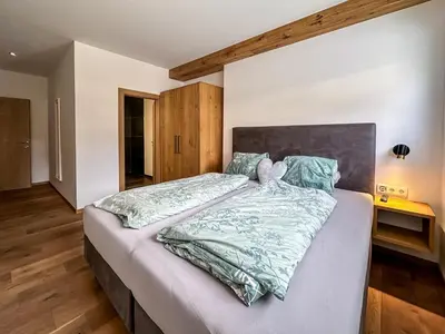 Ein Bett oder Betten in einem Zimmer der Unterkunft Ours Living Hohe Tauern - inkl Sauna