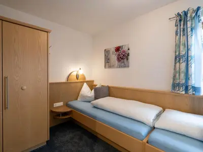 Ein Bett oder Betten in einem Zimmer der Unterkunft Apartment Daniela-6 by Interhome