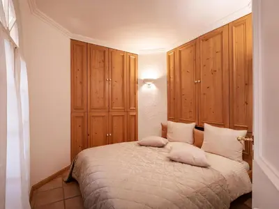 Ein Bett oder Betten in einem Zimmer der Unterkunft Ferienwohnung Olivia