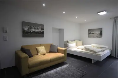 Ein Bett oder Betten in einem Zimmer der Unterkunft Jaegerhaus Appartement Georg
