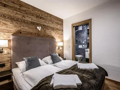 Ein Bett oder Betten in einem Zimmer der Unterkunft Nationalpark Chalet Schwarzes Hörndl