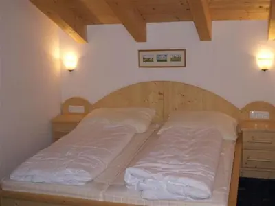 Ein Bett oder Betten in einem Zimmer der Unterkunft Chalet in Königsleiten near Ski Lift