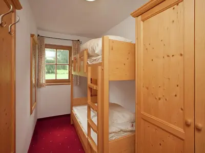 Ein Bett oder Betten in einem Zimmer der Unterkunft Chalet in Königsleiten near Zillertal Ski Area