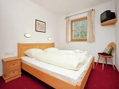 Ein Bett oder Betten in einem Zimmer der Unterkunft Chalet in Königsleiten near Ski Lift