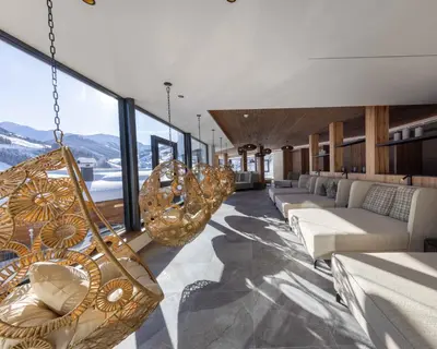 Ein Sitzbereich in der Unterkunft Bachgut, das Resort am Berg - Chalet 3