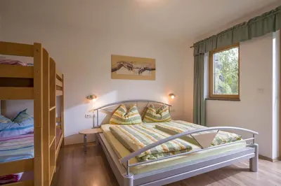 Ein Bett oder Betten in einem Zimmer der Unterkunft Ferienwohnung Fußalm