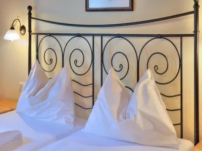 Ein Bett oder Betten in einem Zimmer der Unterkunft Feriendorf Wildschönau- Cozy Alpine Chalet