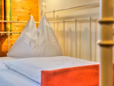 Ein Bett oder Betten in einem Zimmer der Unterkunft Feriendorf Wildschönau near sauna
