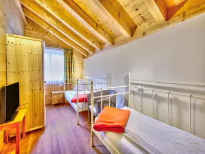 Ein Bett oder Betten in einem Zimmer der Unterkunft Feriendorf Wildschönau -Cozy Escape
