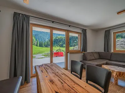 Ein Sitzbereich in der Unterkunft Haus Bergstille Top 1 - 2