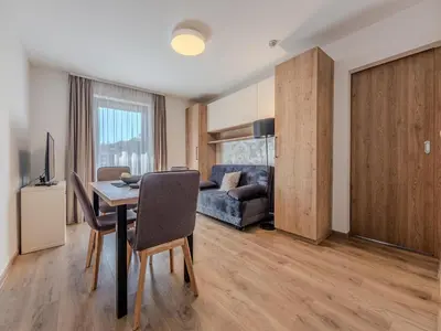Ein Sitzbereich in der Unterkunft Apartment in the center of Jochberg