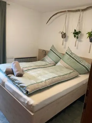 Ein Bett oder Betten in einem Zimmer der Unterkunft Ferienhaus Ehstand
