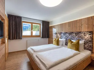 Ein Bett oder Betten in einem Zimmer der Unterkunft Apartment in Brandberg mit Garten by Interhome