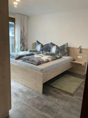 Ein Bett oder Betten in einem Zimmer der Unterkunft Apart Laimböck