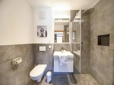 Ein Badezimmer in der Unterkunft Chalet with sauna, Neukirchen