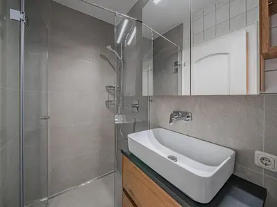 Ein Badezimmer in der Unterkunft Appartements Andrea Cäciel - Alpline Appartements KG